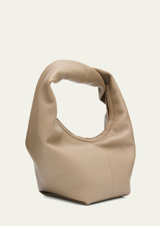 Beige übergroße lässige Hobo‑Schultertasche aus weichem Leder mit integriertem gedrehtem Gurt