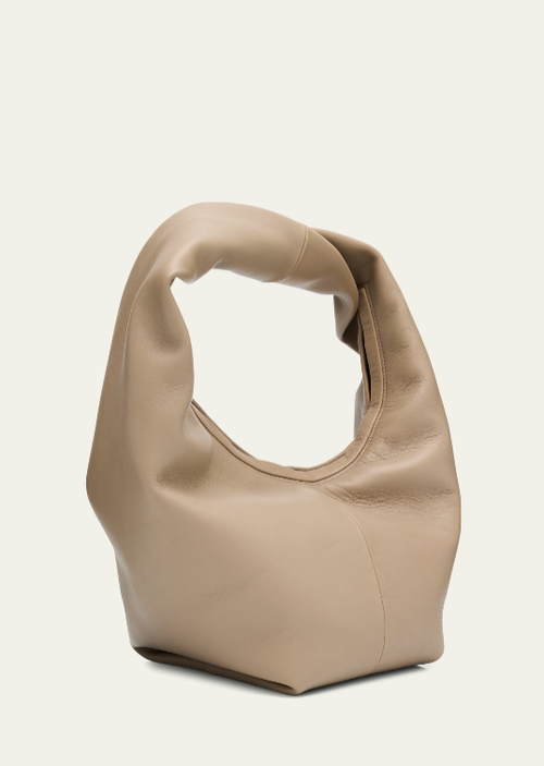 Beige übergroße lässige Hobo‑Schultertasche aus weichem Leder mit integriertem gedrehtem Gurt